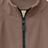 Cloudline 1/2 Zip Long Sleeve Top in Taupe – Close-Up of Front Zipper