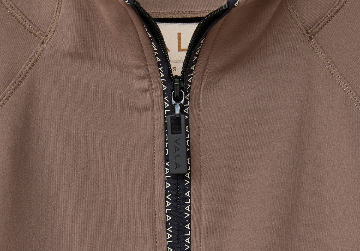 Cloudline 1/2 Zip Long Sleeve Top in Taupe – Close-Up of Front Zipper