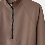 Cloudline 1/2 Zip Long Sleeve Top in Taupe – Close-Up of Front Zipper and Seam Detail