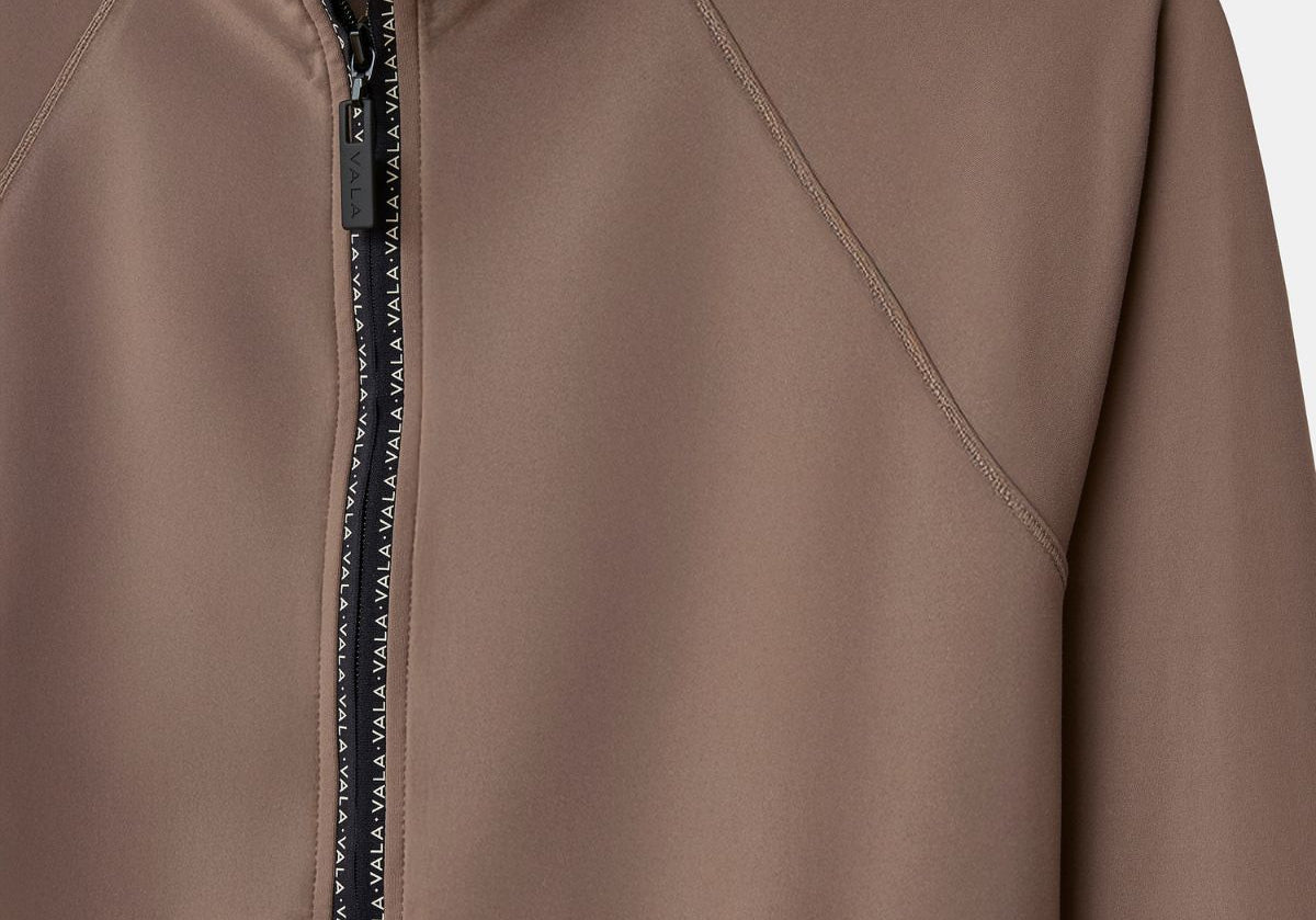 Cloudline 1/2 Zip Long Sleeve Top in Taupe – Close-Up of Front Zipper and Seam Detail