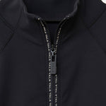 Close-up of the Cloudline Long Sleeve in black with a zipper and VALA branding.