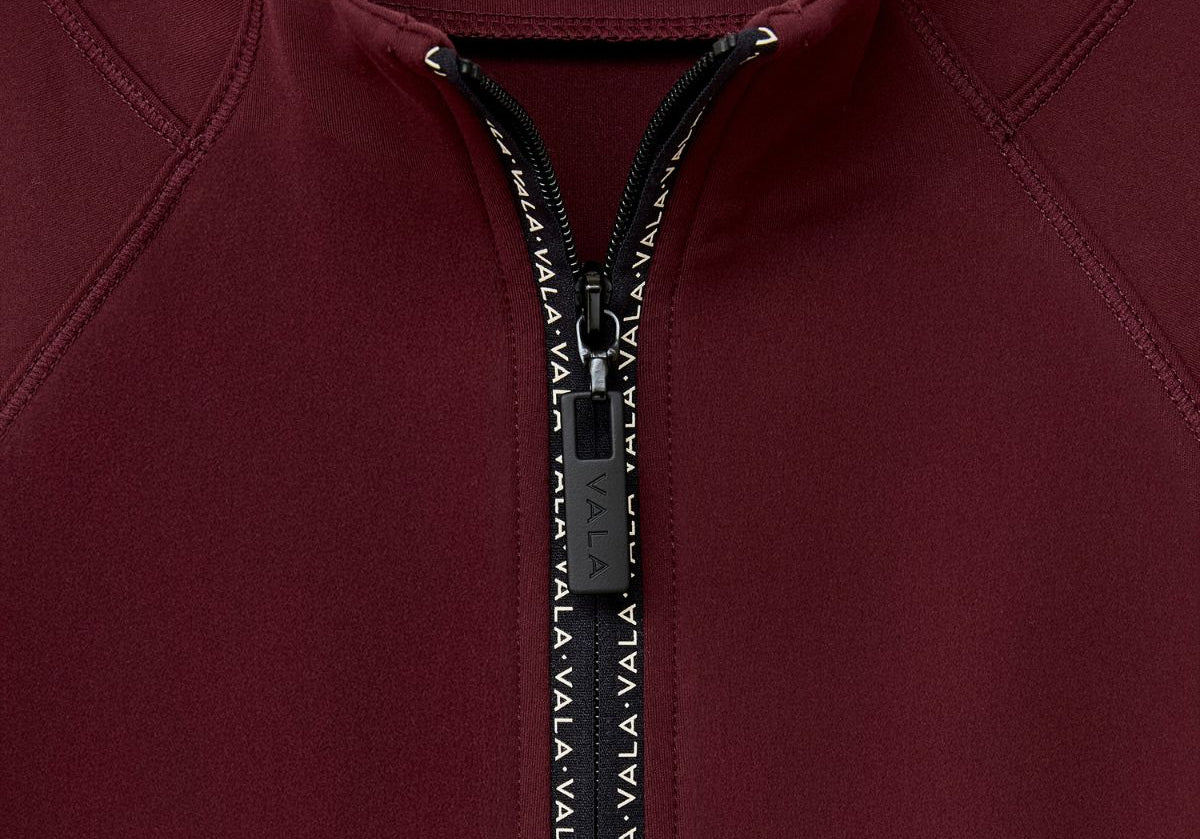 Cloudline 1/2 Zip Long Sleeve Top in Deep Cherry – Close-Up of Front Zipper