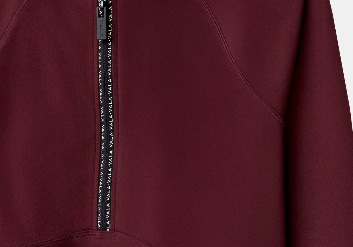Cloudline 1/2 Zip Long Sleeve Top in Deep Cherry – Close-Up of Front Zipper and Seam Detail