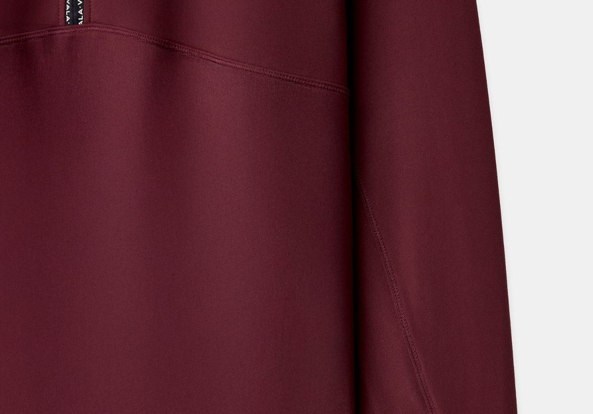 Cloudline 1/2 Zip Long Sleeve Top in Deep Cherry – Sleeve and Hem Detail