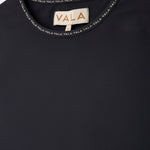 Cloudline Long Sleeve Top in Black – Close-Up of Neckline and VALA Logo Detail