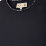 Cloudline Long Sleeve Top in Black – Close-Up of Neckline and VALA Logo Detail