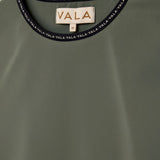 Cloudline Long Sleeve Top in Clover – Close-Up of Neckline and VALA Logo Detail