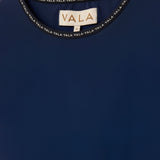 Cloudline Long Sleeve Top in Navy – Close-Up of Neckline and VALA Logo Detail