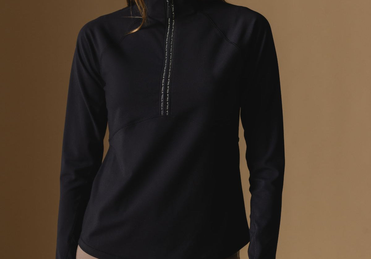 Cloudline Long Sleeve in black with a zipper and VALA branding.