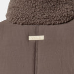 Milla Sherpa Quilted Vest in Taupe – Back VALA Logo and Quilted Panel Detail