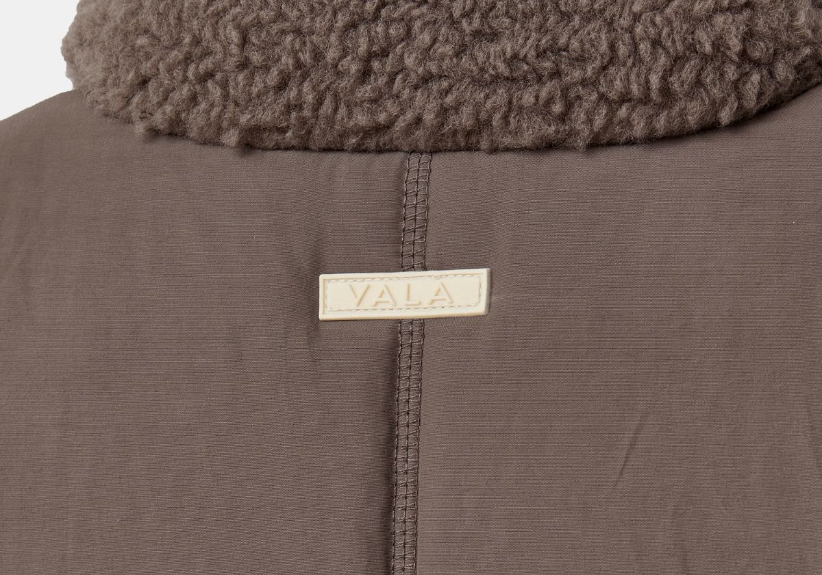 Milla Sherpa Quilted Vest in Taupe – Back VALA Logo and Quilted Panel Detail