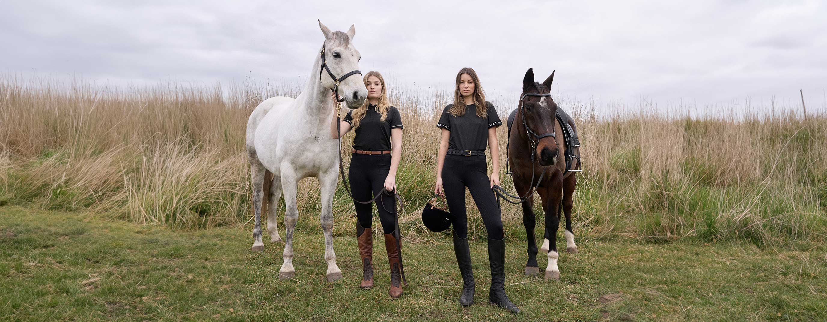Two women with horses wearing Vala Equestrian clothing 